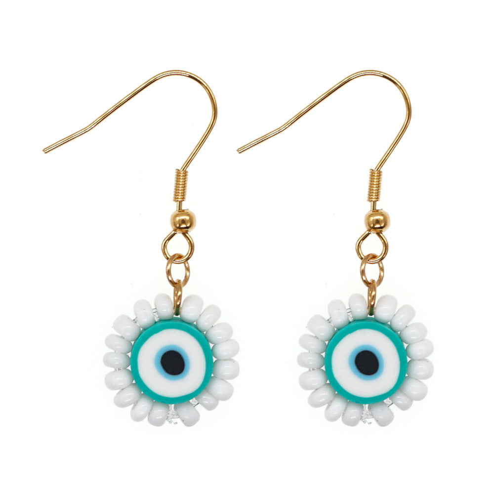 Joyas al por mayor Pendientes de cuentas de arroz de ojos étnicos